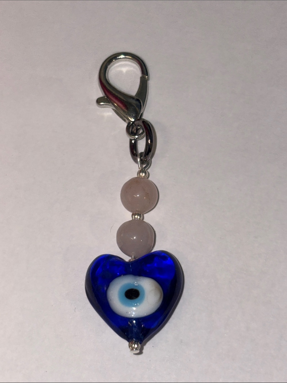 Handcrafted Rose Quartz Evil Eye Heart Glass Purse Charm